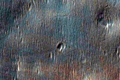 Crater Cross-Section of Pitted Materials with Mafic Spectral Signature