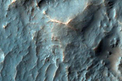 Crater in Crater Exposing Bedrock