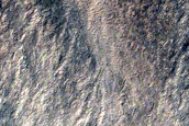 Gullies in Northwest Lowell Crater Wall Originating at Bouldery Deposit