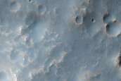 Possible Olivine-Bearing Materials in Terra Sirenum Gullied Crater Rim