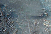 Mafic Minerals Exposed by Crater in Solis Planum