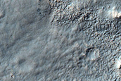Channel on Outer Crater Rim in Claritas Fossae