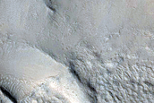 Glacial Flow into Crater Central Pit