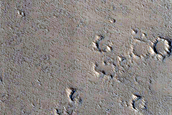 Crescent Shape with Small Crater near Granicus Valles