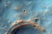 Possible Relict near-Surface Ice