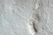 Dipping Layers in Craters in Ismeniae Fossae