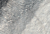 Straight Ridges Running Down Wall along Reull Vallis
