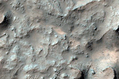 Bright Materials on Rocky Lampland Crater Floor