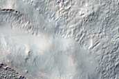 Possible Olivine Exposed around Crater in Terra Sirenum