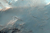 Possible Clay Deposit Exposed in Eastern Nirgal Vallis Walls