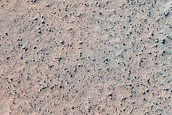 Crater in Aonia Planum
