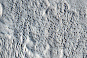 Glacial Erosion and Mantled Central Pit Crater