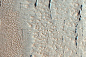 Pits near Ridge and Trough Terrain  in Protonilus Mensae