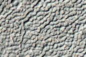 Crater in Claritas Fossae