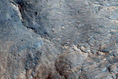Ejecta of Central Peak-Pit Crater