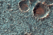 Olivine-Rich Materials on Dogana Crater Floor