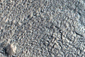 Viscous Flow Feature Mixing with Periglacial Features