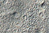 Channels in Claritas Fossae
