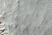 Eastern Rim Wall Exposed in 2-Kilometer Crater