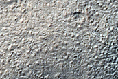 Small Channels Converging above Large Crater