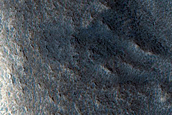 Dipping Layers in Crater near Mamers Valles