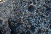Dunes and Light-Toned Rock Outcrop in Trouvelot Crater