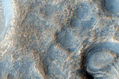 Crater Deposits in Northern Mid-Latitudes