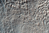 Crater with Brain Terrain for Ejecta near Reull Vallis