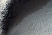 Crater Superposing Banded Terrain in Hellas Planitia