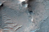 Crater East of Thaumasia Planum