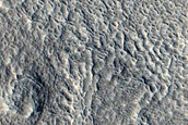 Layered Deposit in Crater near Galaxias Fossae