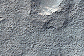 Dipping Layers in Crater in Hellas Montes