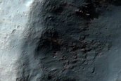 Anomalously Wide Ridges and Lighter Toned Materials