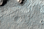 Outcrops South of Columbus Crater in Terra Sirenum