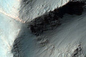 Monitor Low-Albedo Wall Spurs in Coprates Chasma