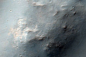 Channel outside Crater in Tyrrhena Terra