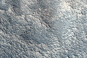 Tongue-Shaped Flow Features in Deuteronilus Mensae