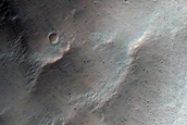 Fresh Crater on Dissected Highland Plateau