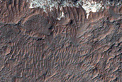 Light-Toned Deposit Exposed between Two Craters in Ladon Valles Basin