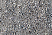 Layered Feature in Crater in Nilosyrtis Mensae