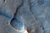 Troughs and Pits around Mesa in Deuteronilus Mensae