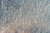 Dipping Layers on Side of Mound in Deuteronilus Mensae
