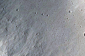 Impact Crater adjacent to Ravine