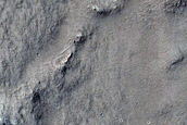 Pitted Cones Intersected by Lobate Contact