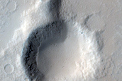 Crater Intersecting Ridge East of Elysium Mons