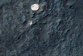 Bright and Round Deposit in Eos Chasma