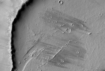 A Circular Feature Crosscut by a Lava Channel