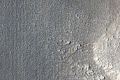 Flow Features in Erebus Montes
