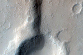 Crater Intersecting Ridge East of Elysium Mons