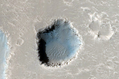 Pit in Hephaestus Fossae